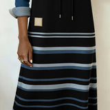 Prugasta haljina s kapuljačom u kombinaciji boja