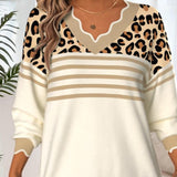 Džemper s leopard uzorkom i kontrastnim V-izrezom