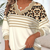 Džemper s leopard uzorkom i kontrastnim V-izrezom